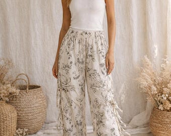 Pantalones fluidos de estilo bohemio para mujer con estampado floral, pantalones ligeros de verano con cintura elástica, pantalones elegantes y cómodos, conjunto ideal para vacaciones.