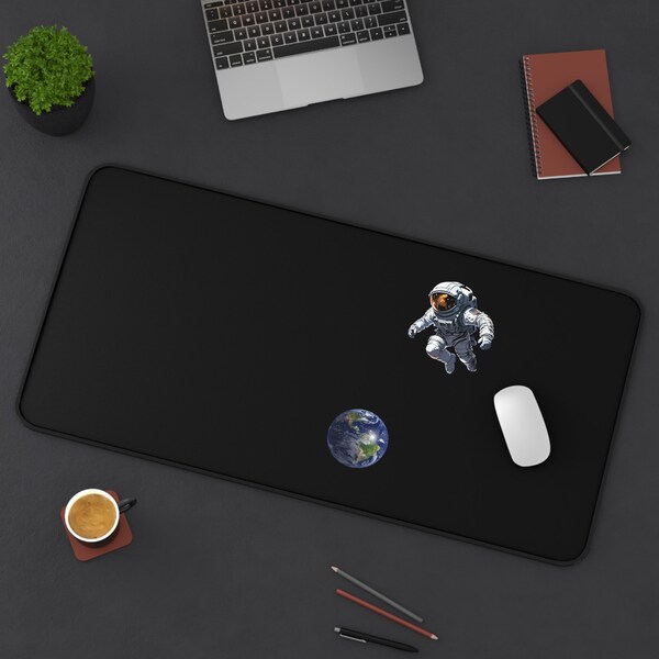 Spaceman Space Suit Floating Above The Earth In The Darkness Of Space Desk Mat