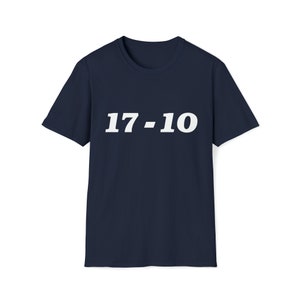 May include: A navy blue t-shirt with the text "17-10" printed in white on the front.