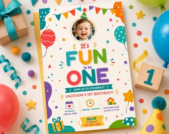 May include: A colorful birthday invitation with the text "It's FUN to be ONE" and a photo of a baby. The invitation includes details for Jackson's 1st birthday, with balloons, stars, and a party hat. A gift box and a wooden block with the number 1 are also visible.