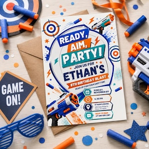 May include: A birthday party invitation with the text "Ready, Aim, Party!" and "Ethan's 9th Birthday Blast." The invitation features toy guns, foam darts, and a target design. Additional items include blue sunglasses and a "Game On!" sign.