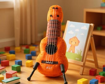 Ukulelegitarr plyschleksak – mjuk musikalisk leksak för barn, babyshowerpresent, låtsasspelgitarr, lärarpresent, musikleksak, SEND, plyschleksak
