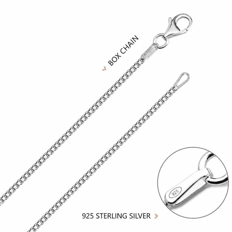 Sterling silver box chain necklace with lobster clasp and a close-up of the 925 stamp on the clasp tag