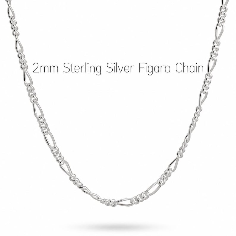 2mm sterling silver figaro chain necklace on a white background, a light everyday chain for a pendant