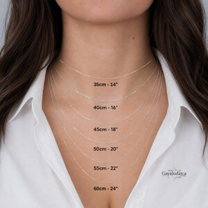 Necklace chain length guide on a woman showing 14 to 24 inch sterling silver chains marked in cm and inches
