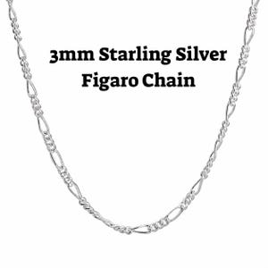 3mm sterling silver figaro chain necklace on a white background with alternating long and short links