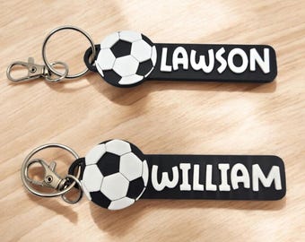 Aangepaste voetbalsleutelhanger: gepersonaliseerd rugzaklabel