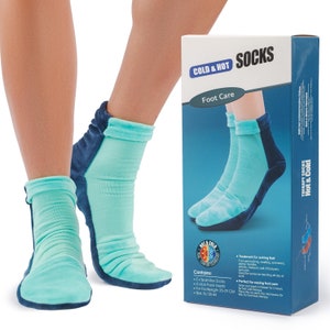 May include: A pair of blue and turquoise cold and hot therapy socks with ice pack inserts. The socks are designed for foot care and pain relief. The product box includes the text "Cold & Hot Socks" and "Foot Care".