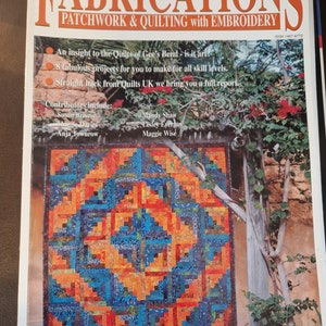 May include: A magazine cover for Fabrications Patchwork & Quilting with Embroidery, featuring a colourful quilt with a geometric pattern. The cover also includes the text "June/July 2003" and "£3.25".