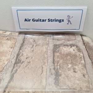 Air Guitar Strings Funny Gag Gifts White Elephant Novelty Gifts, Stocking  Stuffers, Funny Gag Gifts, Air Guitar Strings Prank Gift Funny 