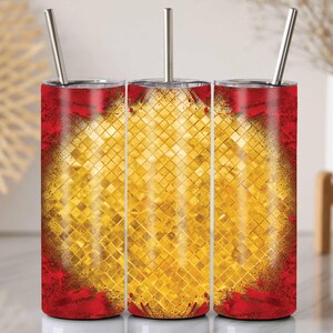 May include: Three stainless steel tumblers with a red and gold design. The tumblers have a red base with gold accents and a central gold mosaic pattern. Each tumbler has a silver straw.