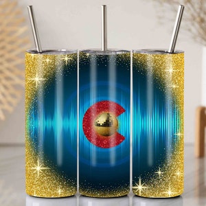May include: Three stainless steel tumblers with lids and straws. The tumblers have a blue and gold glitter background with a red and gold Colorado state outline and a disco ball in the center.