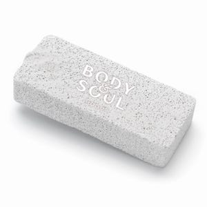 May include: A white pumice stone with the text "BODY & SOUL GOODS" printed on it.