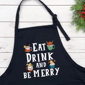 Be Merry Apron, Eat And Drink Apron | Merry Christmas Gift | Happy New Year Apron | Funny Cooking Apron | Happy Xmas Gift Apron
