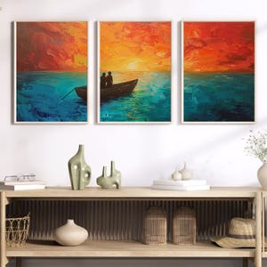 Sunset Serenity: Acrylmalerei eines Paares in einem Boot auf ruhigen Gewässern - Posterset aus 3 Teilen