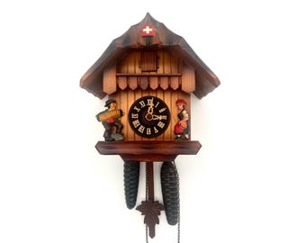 Vintage Non-Working Cuckoo Clock – Swiss Chalet Style with Hand-Painted Figures – 1 Day Movement, Germany/Switzerland