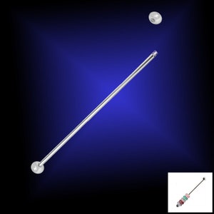 May include: A silver barbell with two silver balls on either end. The barbell is about 1.5 inches long.
