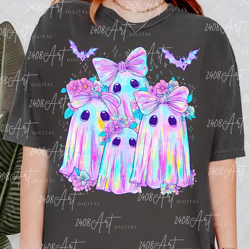 a t-shirt with a graphic design of four colorful, ghostly figures with bows and flowers.
