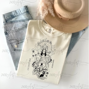 a hat, jeans, and a t - shirt on a white surface