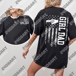 a woman wearing a black shirt with an american flag on it