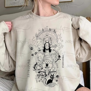 a woman wearing a sweatshirt with a drawing on it