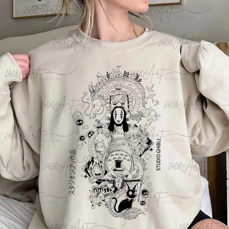 a woman wearing a sweatshirt with a drawing on it
