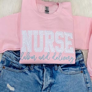 Labor & Delivery Nurse Sweatshirt- Embroidered Unisex Cotton and polyester blend Nurse Themed Crewneck-Nurse gift for RN, Medical Staff