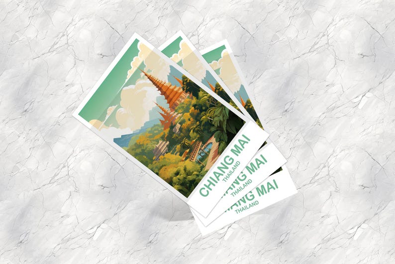 May include: Three square postcards featuring a colorful illustration of a temple complex in Chiang Mai, Thailand. The postcards have a white border and the text "CHIANG MAI" and "THAILAND" in green. The background is a marble surface.