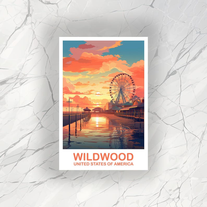 May include: A Wildwood, United States of America art print. The image features a Ferris wheel, pier, and buildings silhouetted against a vibrant sunset sky with orange, pink, and blue hues. The text "WILDWOOD" and "UNITED STATES OF AMERICA" is displayed at the bottom.