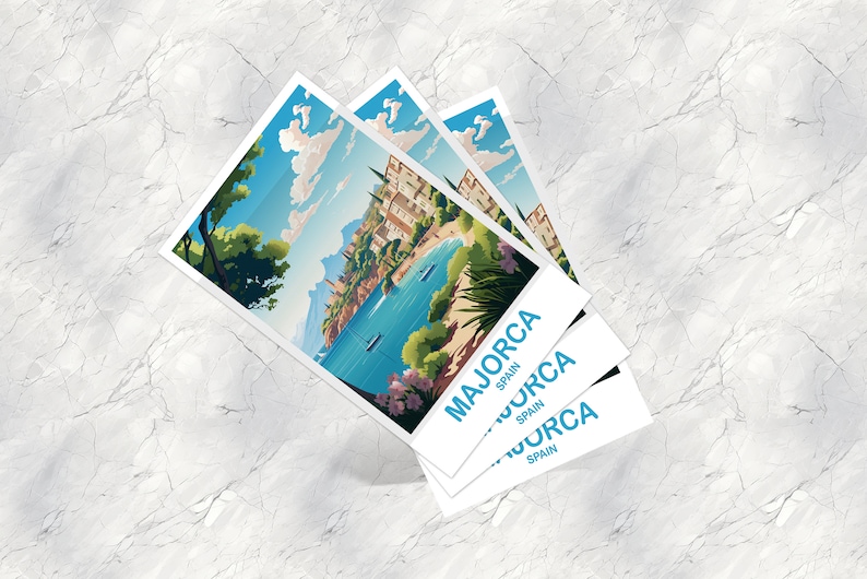 May include: Three postcards stacked on top of each other with a colorful illustration of a beach scene with a town in the background. The text on the postcards reads "Majorca Spain".