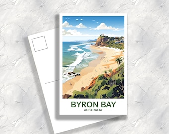 May include: A postcard featuring a stylized illustration of Byron Bay, Australia. The image depicts a beach with turquoise water, white waves, and a sandy shore. Green vegetation and a blue sky with clouds complete the scene. The text "BYRON BAY AUSTRALIA" is at the bottom.