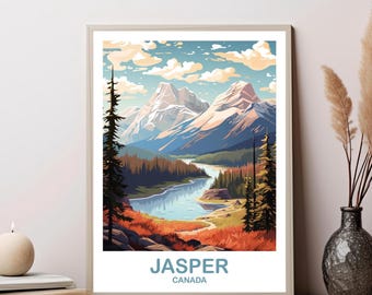 May include: A framed art print featuring a scenic landscape of Jasper, Canada. The artwork depicts snow-capped mountains, a winding river, and evergreen trees under a blue sky with clouds. The word "JASPER" and "CANADA" are printed at the bottom.
