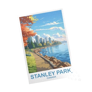May include: A completed jigsaw puzzle featuring a scenic view of Stanley Park in Canada. The image depicts a waterfront pathway, trees with autumn foliage, and a cityscape under a blue sky. The puzzle's text reads "STANLEY PARK, CANADA."