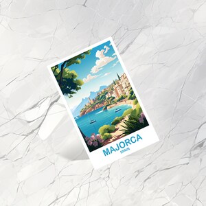 May include: A postcard with a colorful illustration of a coastal town in Majorca, Spain. The postcard features a blue sky with white clouds, a turquoise blue sea, green trees, and a white building with a red roof. The text on the postcard reads "MAJORCA SPAIN".
