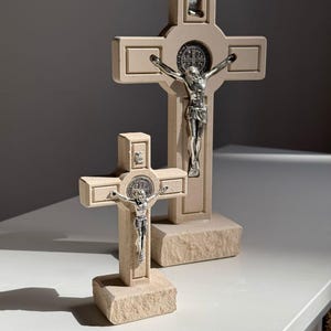 St. Benedict crucific standing cross, standing crucifix. Crafted from natural limestone, St. Benedict medal on the front, and on the back.