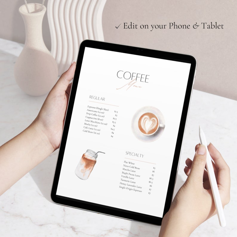 May include: A digital tablet displaying a coffee menu with a watercolor illustration of a coffee drink. The menu lists regular coffee options like espresso, Americano, drip coffee, cappuccino, latte, macchiato, cafe latte, and cold brew. Specialty coffee options include flat white, nitro cold brew, matcha latte, maple pecan latte, vanilla latte, turmeric latte, honey lavender latte, and single origin espresso.