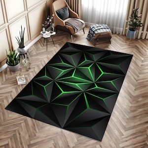 May include: Black and green geometric area rug with a modern abstract design. The rug features a repeating pattern of triangles with green accents.