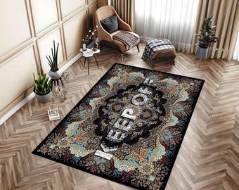 May include: A rectangular area rug featuring a dark black central medallion surrounded by intricate, multi-colored floral and paisley patterns in shades of blue, orange, and cream. The word KEEP OFF is printed in large, bold, white capital letters.