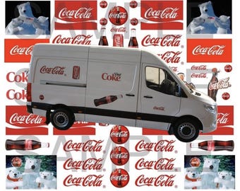 May include: A white van with Coca-Cola branding. The van has a large Coca-Cola logo on the side and smaller logos on the back. The van is surrounded by images of Coca-Cola bottles, cans, and polar bears.