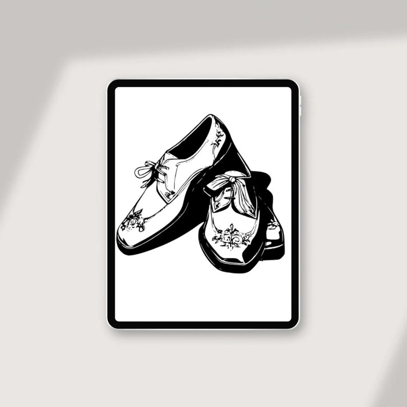May include: A pair of black leather shoes with intricate floral embroidery. The shoes have a lace-up design and a pointed toe.