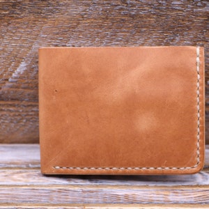 Cartera de cuero plegable tradicionalista hecha a mano