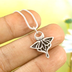sterling silver luna moth necklace petite insect charm dainty delicate decorative wings jewelry moon night creature nature enthusiast