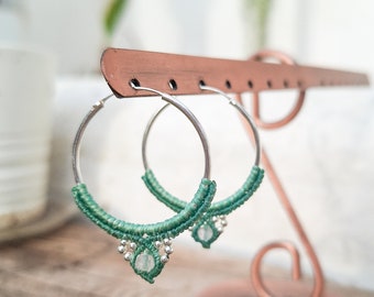 Hoop earrings in sterling silver, macrame, and natural stones. A handmade, minimalist design.