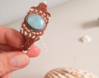 Macramé bracelet with natural Larimar and 925 silver. Handmade jewelry with energy stones.