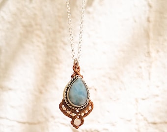 Larimar stone pendant in sterling silver. Macramé jewelry with natural and energetic stones.