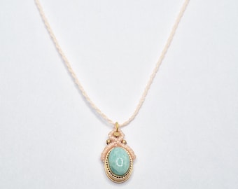 Macrame pendant with Amazonite stone and brass details. Handmade jewelry.