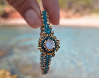 Pulsera SUNNA · Luz del sol en piedra natural.