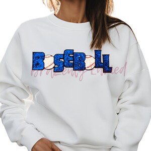 May include: White sweatshirt with a blue and white baseball graphic that says "Baseball".