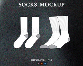 May include: A mockup of three white socks. The socks are shown in a flat lay, with two socks lying flat and one sock folded in half. The socks are all white with a gray heel and toe.