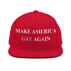 May include: Red baseball cap with the text "MAKE AMERICA GAY AGAIN" in white letters. The word "GAY" is in rainbow colors.